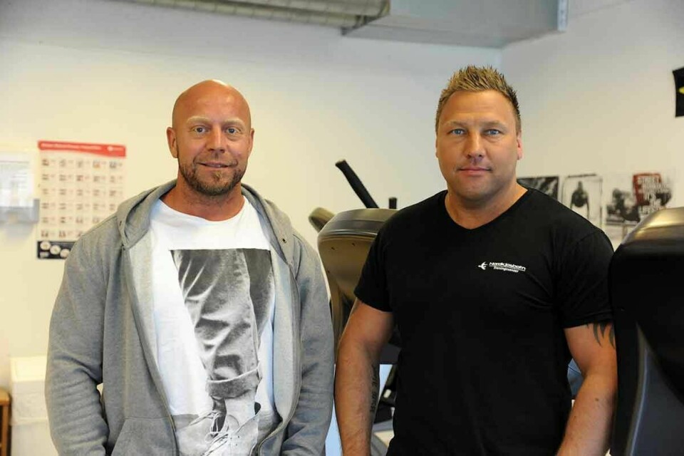 UTVIKLER: Trond Dahlø og Thor Arne Olsen forteller at det har vært noen harde år de har hatt med treningssenteret i oppstartsfasen. Nå skal de utvikle treningssenteret videre. Foto: Maiken Kiil Bartholdsen